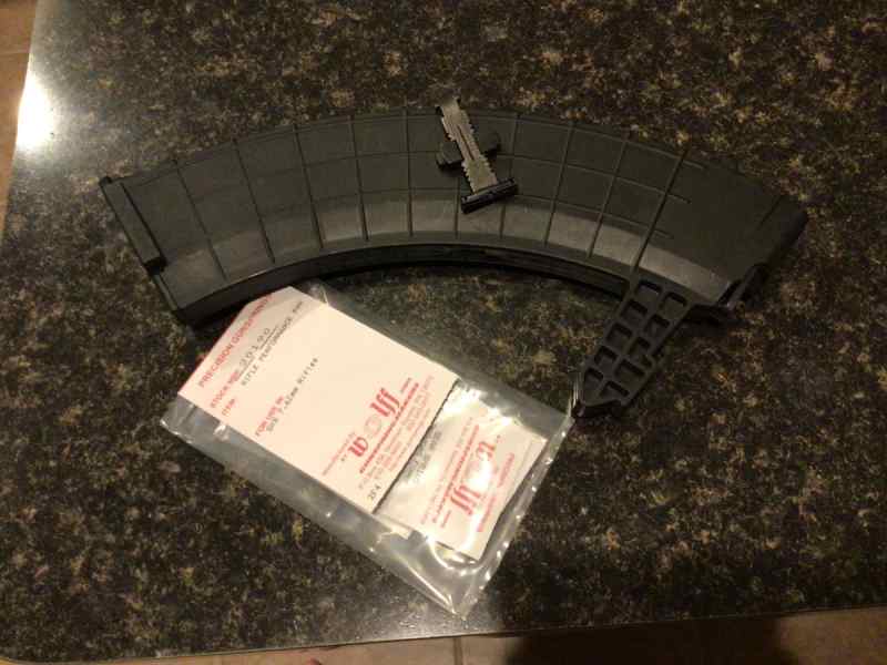 SKS parts, mag, night sight and spring kit