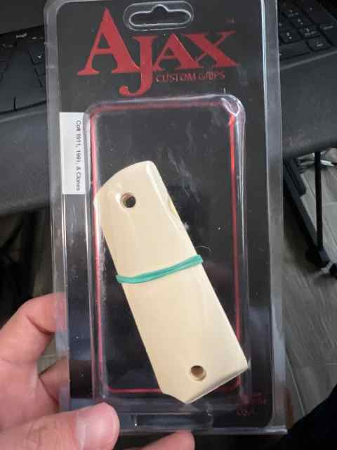 Ajax 1911 faux ivory grips